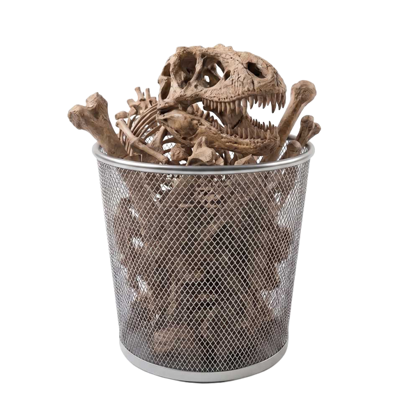 Dinosaur skeleton stuffed into an office wastebasket
